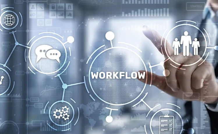 A person interacting with a digital workflow interface