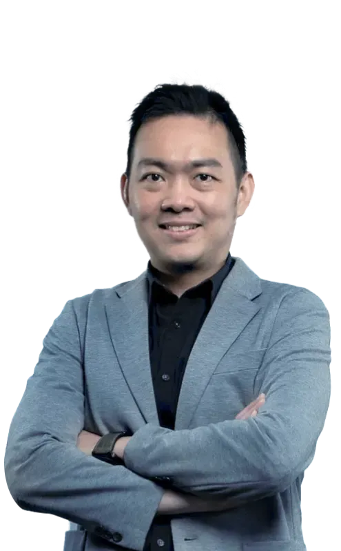 Desmond, the Chief Technology Officer at Trinergy, confidently posing in a professional setting, symbolizing leadership and innovation.